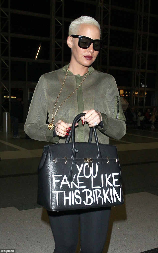 Khloe Kardashian shows off Hermès Birkin bag painted by Alec Monopoly